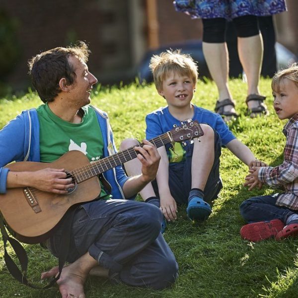 Children singing on family retreat