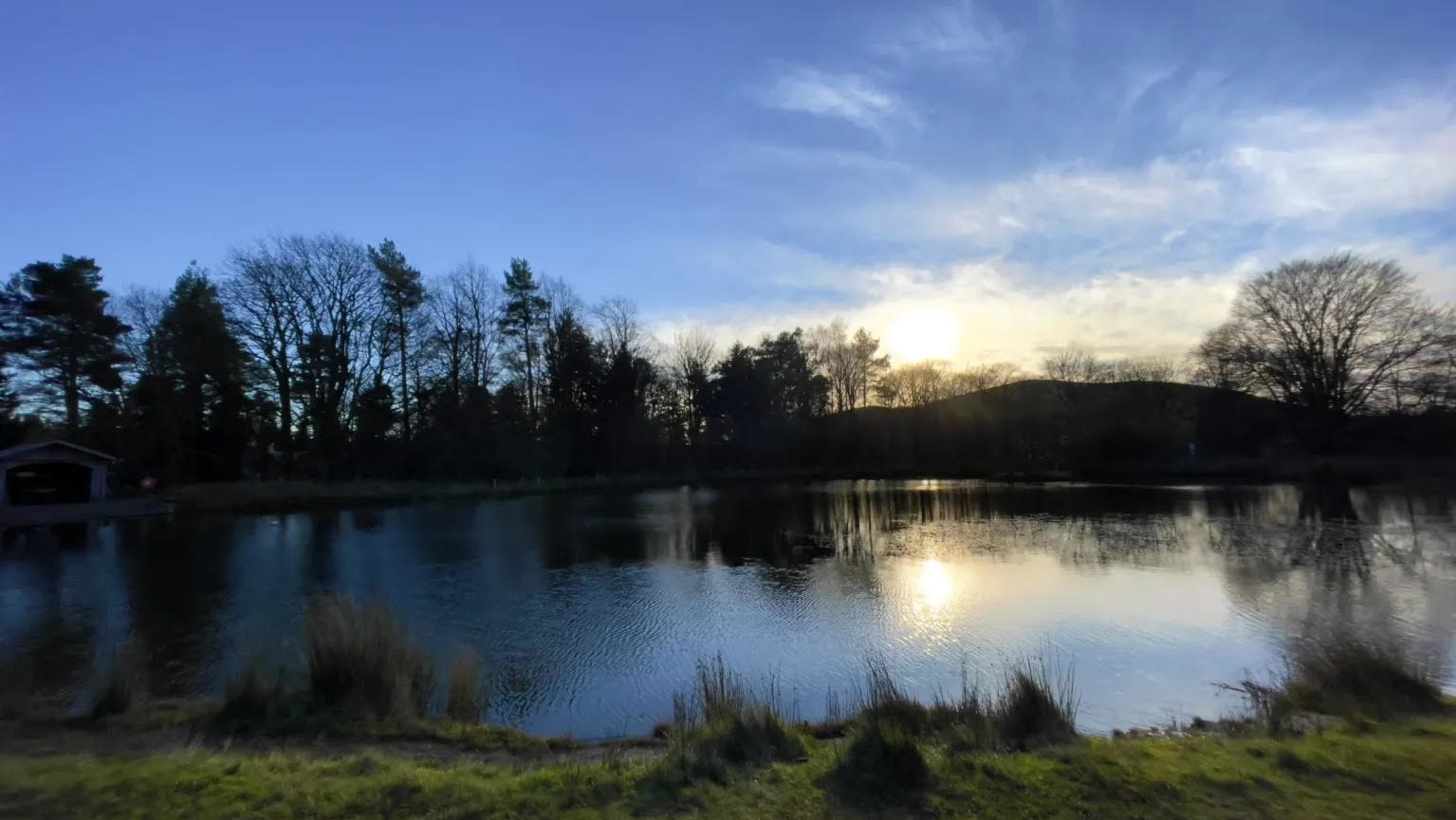 Water with hills in background