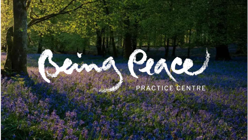 Being Peace calligraphy across image of bluebell wood