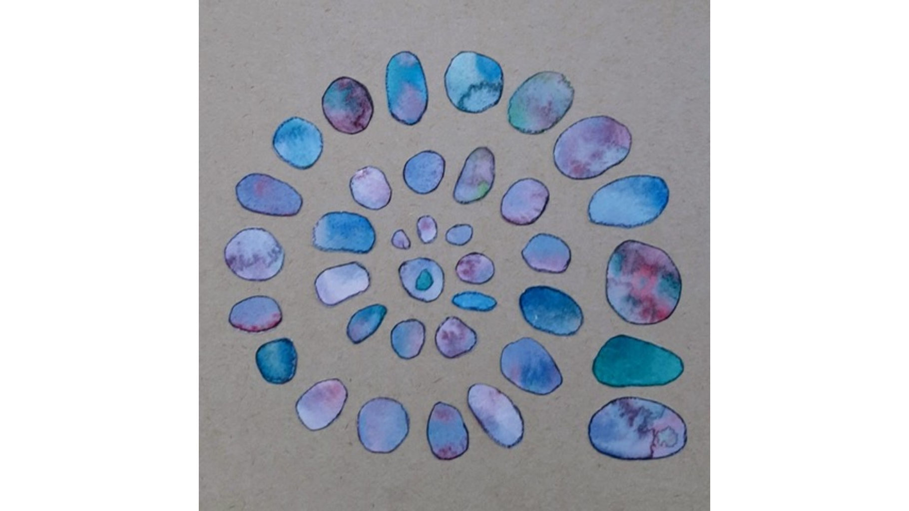 Spiral of blue stone images on a grey background